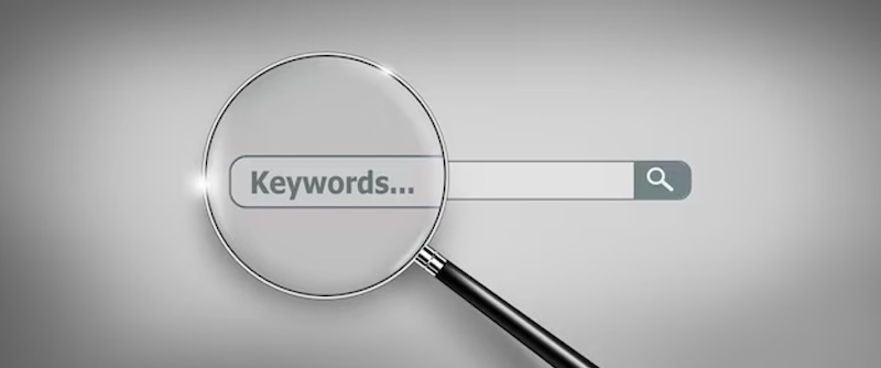 magnifying-glass-keywords-research-saas-benefits