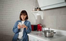 woman-using-home-technology-nudge-theory
