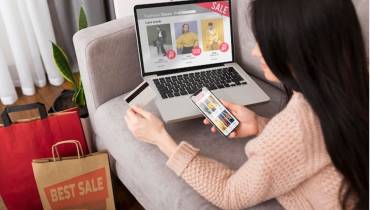 woman-laptop-smartphone-shopping-online-holding-credit-card