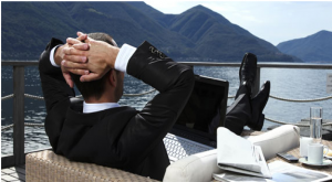 Man relaxing with computer on ship deck_1.png