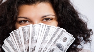woman with dollar bills_0.jpg