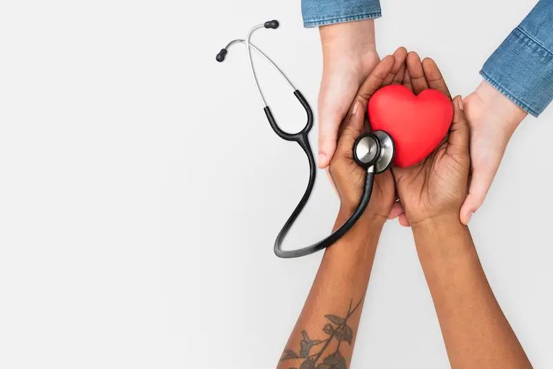 hand_cupping_heart_health_stethoscope 