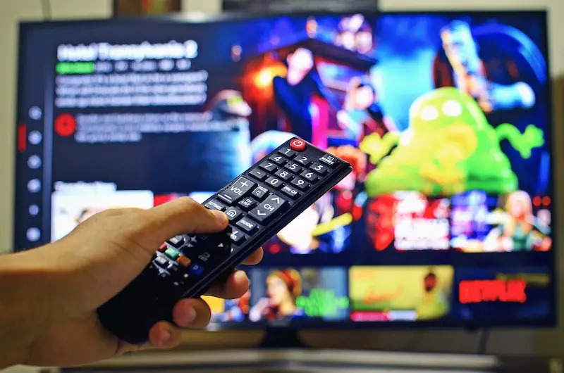 Man-Pointing-Remote-Control-On-TV-Video-Streaming-On-Demand