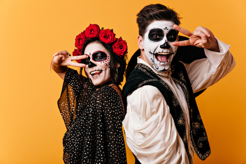 cheerful-young-man-woman-halloween-costume-having-fun