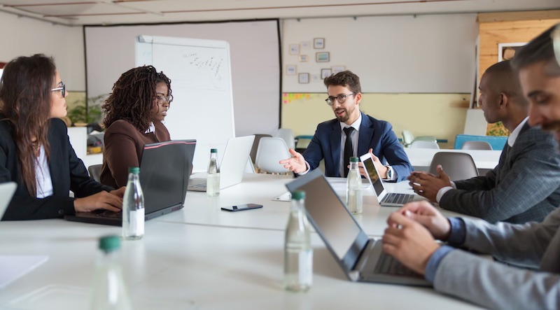 businessman-focused-communicating-training-workers