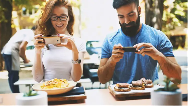 man-woman-taking-pictures-of-their-food-plate-usr-generated-content