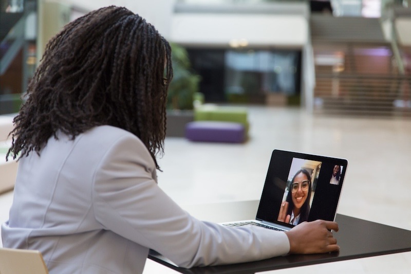 young-businesswoman-using-laptop-online-interview