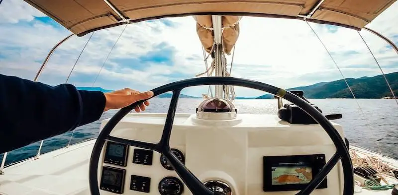 boat-control-panel-with-steering-wheel.jpg