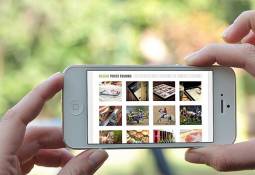 person-checking-getty-images-site-smartphone