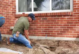 men-digging-foundation-repair-works