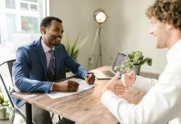 accountant-cleint-sitted-office-chatting-happy