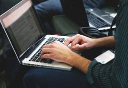 person-typing-laptop-blogging-start-blog