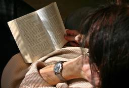 female-sitted-reading-novel-enjoyable-experience