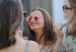 young-woman-smiling-among-friends-millenials-gen-z-marketing