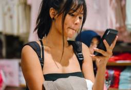 woman-checking-smartphone-internet-user-shopper