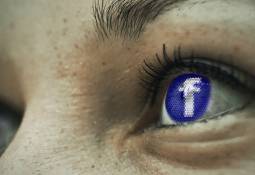 woman-closeup-eyes-facebook-logo
