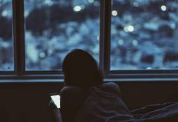 woman-mobile-bed-monitor-your-childs-activities-on-mobile-devices