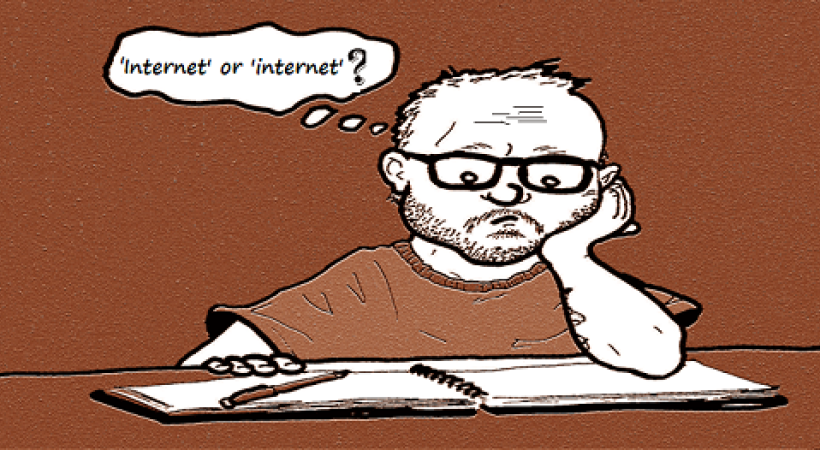 cartoon-of-man-open-book-pen-thinking