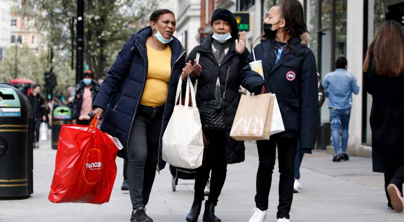 young-women-happy-walking-shopping-bags-consumers-desire-high-street-to feel-safe