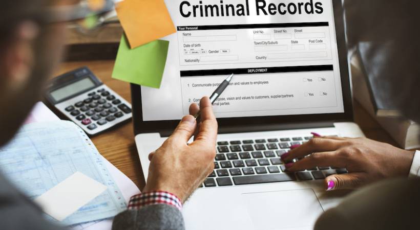officials-doing-criminal-records-background-check