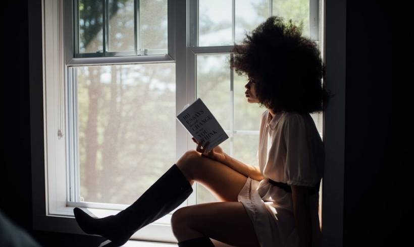 woman-reading-books-on-writing-for-when-you-need-to-be-inspired