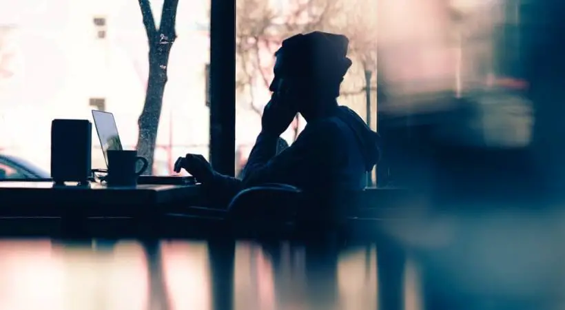 woman-freelancer-silhouette-coffee-shop