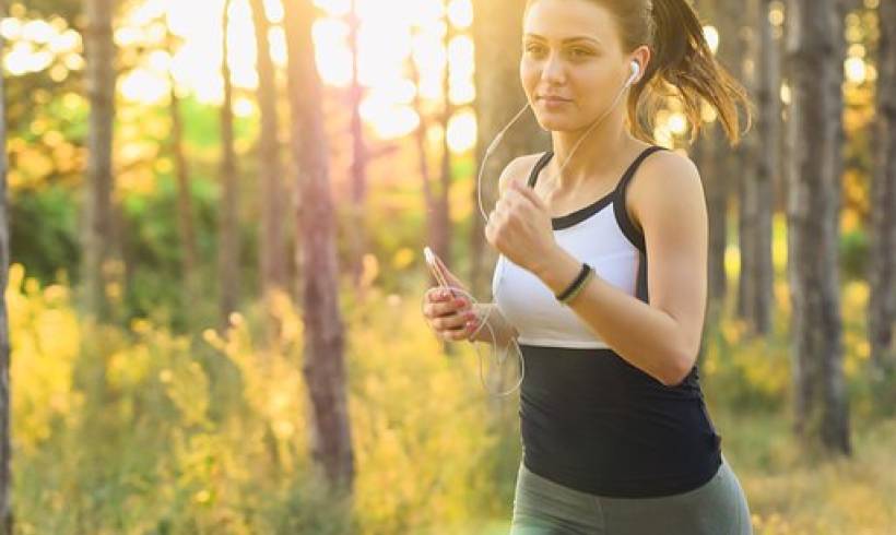 woman-jogging-lets-get-physical-exercise-while listening-music