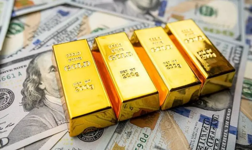 us-dollar-with-gold-bars-investment