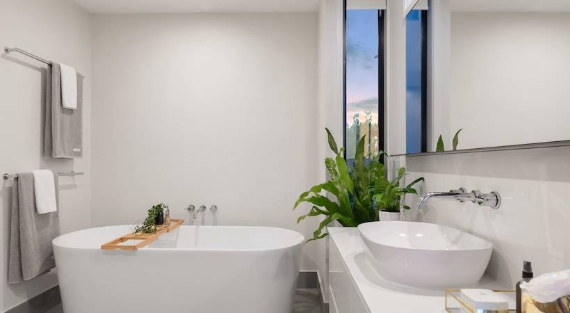 white_ensuite_bathroom_with_stand-alone_bath_tub Image for Most Searched ‘Bathroom Paint’ Is White, But Psychologist Suggests It’s ‘Uninspiring’