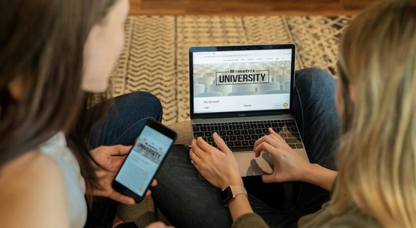 young-women-using-laptop-smartphone-online-learning-rise-of-elearning