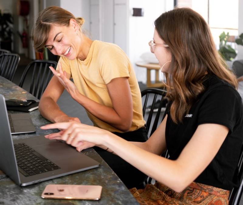 Women Having Conversation Digital Marketing