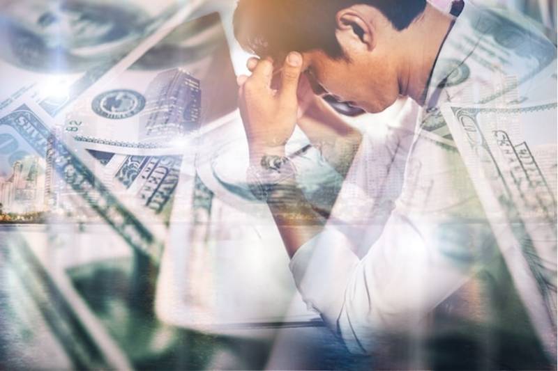 Businessman Economic Hard Times Thinking Image for How SMEs Are Weathering the Cost-of-Living Crisis
