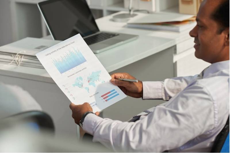 businessman-studying-business-charts-data-analysis
