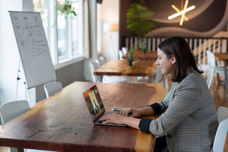 businesswoman working in an office on a virtual call