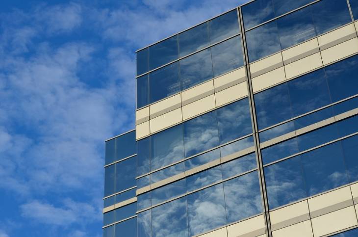 De-Risking Your Public Cloud with Cloud Security Posture Management Solutions office-building-sky-cloud-security
