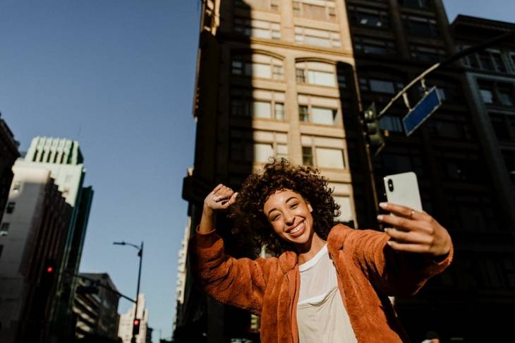 young-woman-influencer-urban-area-city-taking-selfie