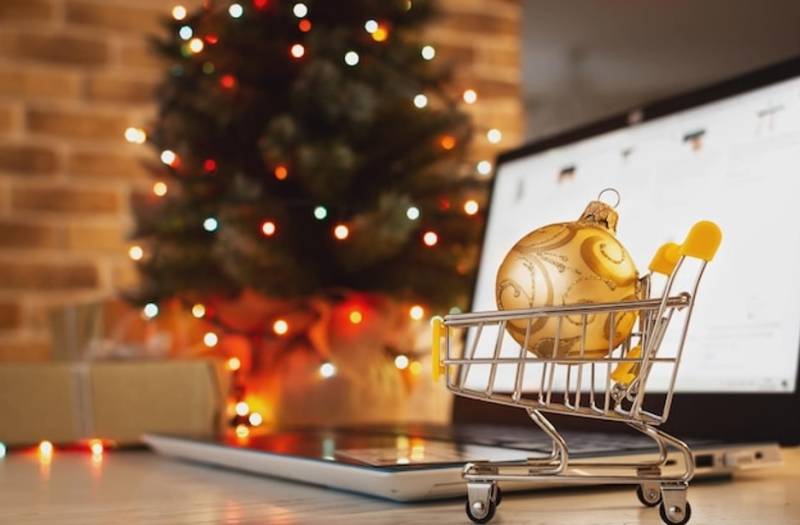 laptop and shopping cart online business cyber secure christmas