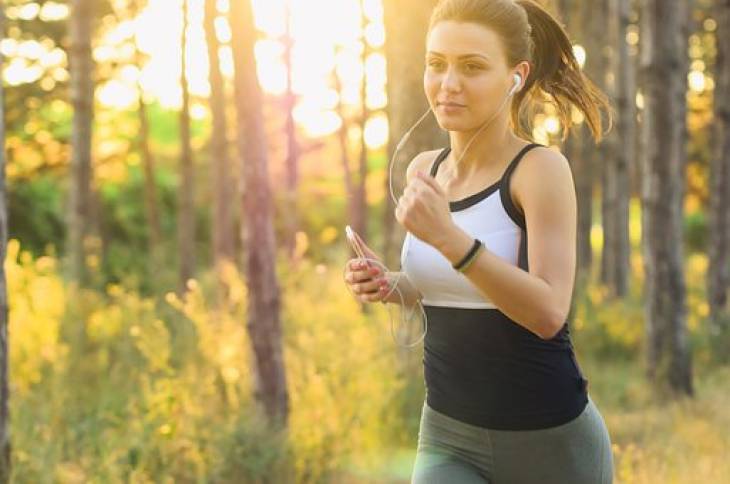 woman-jogging-lets-get-physical-exercise-while listening-music