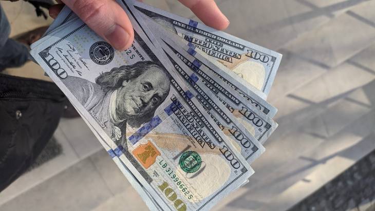 Secrets to Improve Your Financial Health hand-holding-dollar-notes-improve-financial-health