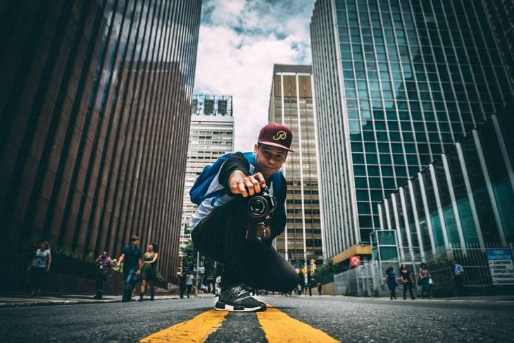 10 Best Sites for Photographers to Showcase Creative Work man-photographer-urban-streets-sites-for-photographers-to-showcase-their-creative-work