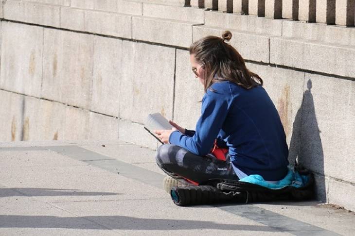 woman-reading-book-outside