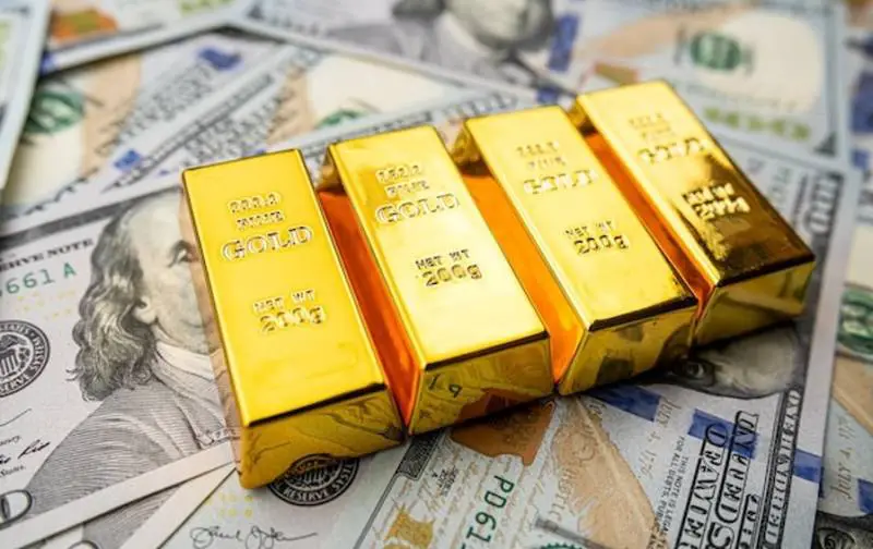us-dollar-with-gold-bars-investment