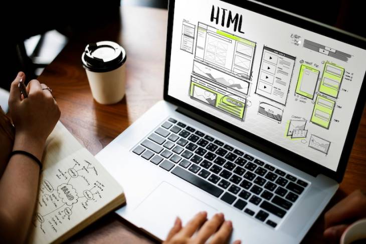 man-working-on-laptop-web-design