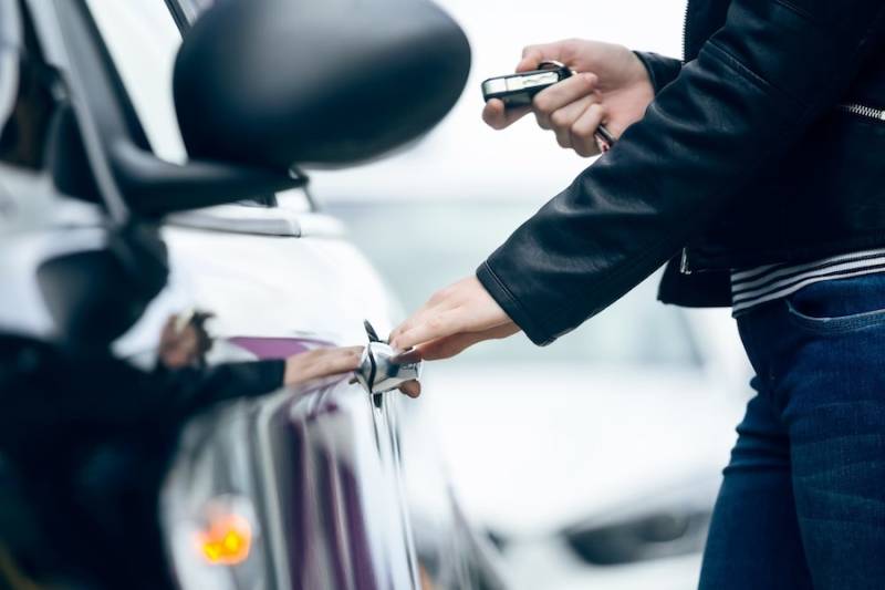 woman opening car sercurity