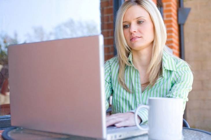 woman-entrepreneur-laptop-motivated-positive