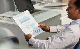 businessman-studying-business-charts-data-analysis