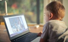 small-boy-using-laptop - Raising Kids in the Digital World: Screen Time Stats &amp; Tips - illustration