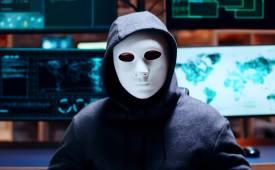 cyber-criminal-wearing-white-mask-guard-agains-malwake-back-up-data