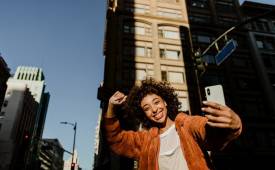 young-woman-influencer-urban-area-city-taking-selfie