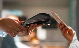 person-paying-with-contatless-technology-restaurant